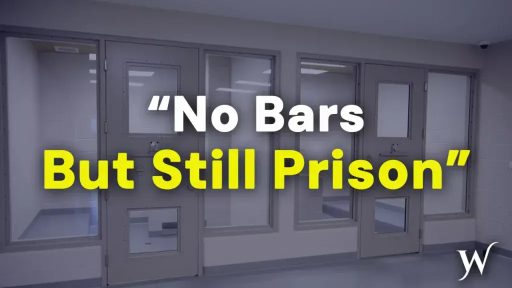 What are the living conditions like in a federal prison camp?